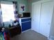 Well-lit room with colorful accents, featuring a window and a playful atmosphere at 10360 Wilson Rd, Brownsburg, IN 46112
