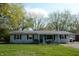 Exterior view of home with mature trees at 10360 Wilson Rd, Brownsburg, IN 46112