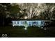 Charming single-story home with a well-lit front yard and lush green lawn at 10360 Wilson Rd, Brownsburg, IN 46112