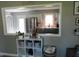 Open-concept layout with a view of a modern kitchen featuring stainless steel appliances and stylish finishes at 10360 Wilson Rd, Brownsburg, IN 46112