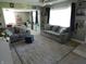 Inviting living room with two sofas, a modern rug, and natural light, creating a welcoming and comfortable space at 10360 Wilson Rd, Brownsburg, IN 46112