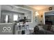 Cozy living room view into kitchen features modern design and comfortable seating at 10360 Wilson Rd, Brownsburg, IN 46112