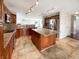 Spacious, updated kitchen featuring granite counters, stainless appliances, and hardwood floors at 10376 Alice Ct, Fishers, IN 46038