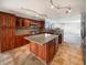 Gorgeous kitchen featuring granite counters, an island, and stainless steel appliances at 10376 Alice Ct, Fishers, IN 46038