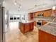 Modern kitchen features granite counters, a center island, and stainless appliances at 10376 Alice Ct, Fishers, IN 46038