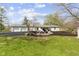 Expansive backyard featuring fresh landscaping and a patio at 10421 Hillsdale Dr, Carmel, IN 46032