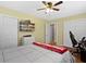 Bedroom featuring hardwood floors, a ceiling fan, lots of natural light, and an open closet at 10421 Hillsdale Dr, Carmel, IN 46032