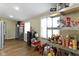Well-organized pantry featuring shelving, storage solutions, and natural light from windows at 10421 Hillsdale Dr, Carmel, IN 46032