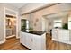 Open concept kitchen with a center island, seamless access to the bathroom and a dining nook at 106 S Wayburn St, Indianapolis, IN 46229
