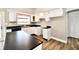 Bright kitchen featuring white cabinets and stainless-steel appliances at 106 S Wayburn St, Indianapolis, IN 46229