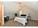Cozy bedroom with neutral walls, carpet and matching lamps at 106 S Wayburn St, Indianapolis, IN 46229