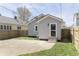 Cozy backyard featuring a concrete patio and mature trees providing shade and privacy at 109 S 10Th S Ave, Beech Grove, IN 46107