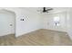 Open living space with light colored floors, white walls, and modern fixtures at 109 S 10Th S Ave, Beech Grove, IN 46107