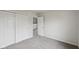 Bedroom features neutral walls and carpet and a double door closet at 10905 Amber Glow Ln, Indianapolis, IN 46229