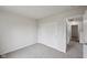 Bedroom featuring neutral walls and carpet and a double door closet at 10905 Amber Glow Ln, Indianapolis, IN 46229
