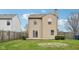 Two-story home featuring a sliding glass door and a well-maintained lawn at 10905 Amber Glow Ln, Indianapolis, IN 46229