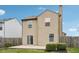 Two-story home featuring a sliding glass door and an enclosed yard at 10905 Amber Glow Ln, Indianapolis, IN 46229