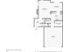 First floor layout featuring the living room, dining room, kitchen, laundry, garage, and foyer at 10905 Amber Glow Ln, Indianapolis, IN 46229