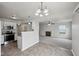 Open-concept living spaces include kitchen with tile floors, living room with fireplace, and modern lighting at 10905 Amber Glow Ln, Indianapolis, IN 46229