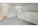 Loft space with neutral carpet and view to bathroom at 10905 Amber Glow Ln, Indianapolis, IN 46229