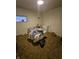 Bedroom with vintage green walls and old carpet at 1152 W 375 N, Anderson, IN 46011
