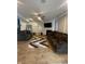 Spacious living room with a fireplace, large TV, and comfortable couches at 11726 Zander Dr, Indianapolis, IN 46235