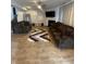 Spacious living room with a fireplace, large TV, and comfortable couches at 11726 Zander Dr, Indianapolis, IN 46235