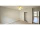 Bedroom featuring a ceiling fan, neutral carpet, and a closet at 13648 Seven Oaks Dr, Fishers, IN 46038