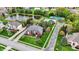 Aerial view of a gorgeous home with large yard, near a pond, tennis court and pool at 13682 Frenchmans Creek, Carmel, IN 46032