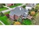 Aerial view of backyard featuring a gray roof and a fenced-in patio area at 13682 Frenchmans Creek, Carmel, IN 46032