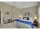 Spacious bedroom features high ceilings, ceiling fan and coordinated furniture at 13682 Frenchmans Creek, Carmel, IN 46032