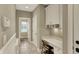 Bright hallway with built-in desk area, ample storage, and access to additional rooms at 13682 Frenchmans Creek, Carmel, IN 46032