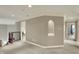 Upper hallway featuring wainscoting and multiple doorways at 13682 Frenchmans Creek, Carmel, IN 46032