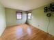 Inviting bedroom with hardwood floors and natural light, creating a cozy and comfortable atmosphere at 1387 W Furry Rd, Fountaintown, IN 46130