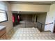 Open concept space showcasing a view into the living room with retro paneled walls from an upper level at 1387 W Furry Rd, Fountaintown, IN 46130