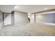 Finished basement with neutral carpet, staircase, and plenty of space for activities at 14814 Edgebrook Dr, Fishers, IN 46040