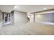 Finished basement with neutral carpet, staircase, and plenty of space for activities at 14814 Edgebrook Dr, Fishers, IN 46040