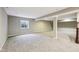 Spacious basement featuring neutral carpet and a large window for natural light at 14814 Edgebrook Dr, Fishers, IN 46040