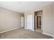 Cozy bedroom with multiple doorways offers seamless access to other rooms in the house at 14814 Edgebrook Dr, Fishers, IN 46040