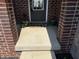 Inviting front entrance with a brick facade and decorative plants at 14814 Edgebrook Dr, Fishers, IN 46040
