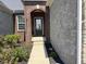 Inviting front entrance with brick accents and a well-maintained walkway at 14814 Edgebrook Dr, Fishers, IN 46040