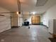 Spacious garage with epoxy flooring, storage cabinets, and ample room for vehicles and equipment at 14814 Edgebrook Dr, Fishers, IN 46040