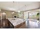Spacious kitchen featuring a large island, stainless steel appliances, and an open layout at 14814 Edgebrook Dr, Fishers, IN 46040