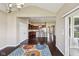 Open-concept kitchen features modern appliances, a central island with seating, and dark hardwood flooring at 14814 Edgebrook Dr, Fishers, IN 46040