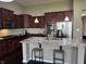 Bright kitchen featuring stainless steel appliances, granite countertops, and a large island at 14814 Edgebrook Dr, Fishers, IN 46040