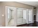 Office featuring glass paneled French doors and view of a front-facing window at 14814 Edgebrook Dr, Fishers, IN 46040
