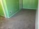 Empty bedroom with green walls and neutral carpet. Ready for personalization with new furniture at 1640 Lawton Ave, Columbus, IN 47201