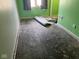 View of bare bedroom floor, ready for new carpet installation to transform the space at 1640 Lawton Ave, Columbus, IN 47201