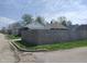Home's exterior and wooden fence at 1640 Lawton Ave, Columbus, IN 47201
