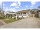 Charming home featuring a front porch with white railings, offering a welcoming curb appeal at 1739 N Alton Ave, Indianapolis, IN 46222